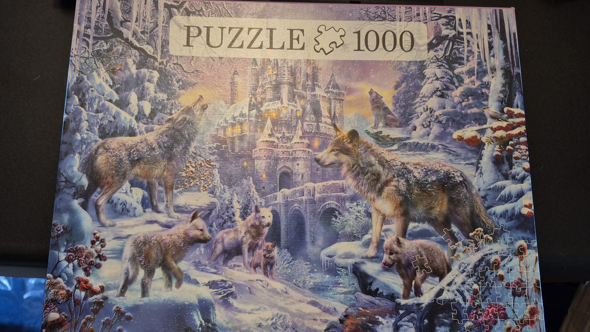 Puzzle – Wölfe vor winterlichem Schloss – 1000 Teile – vollständig